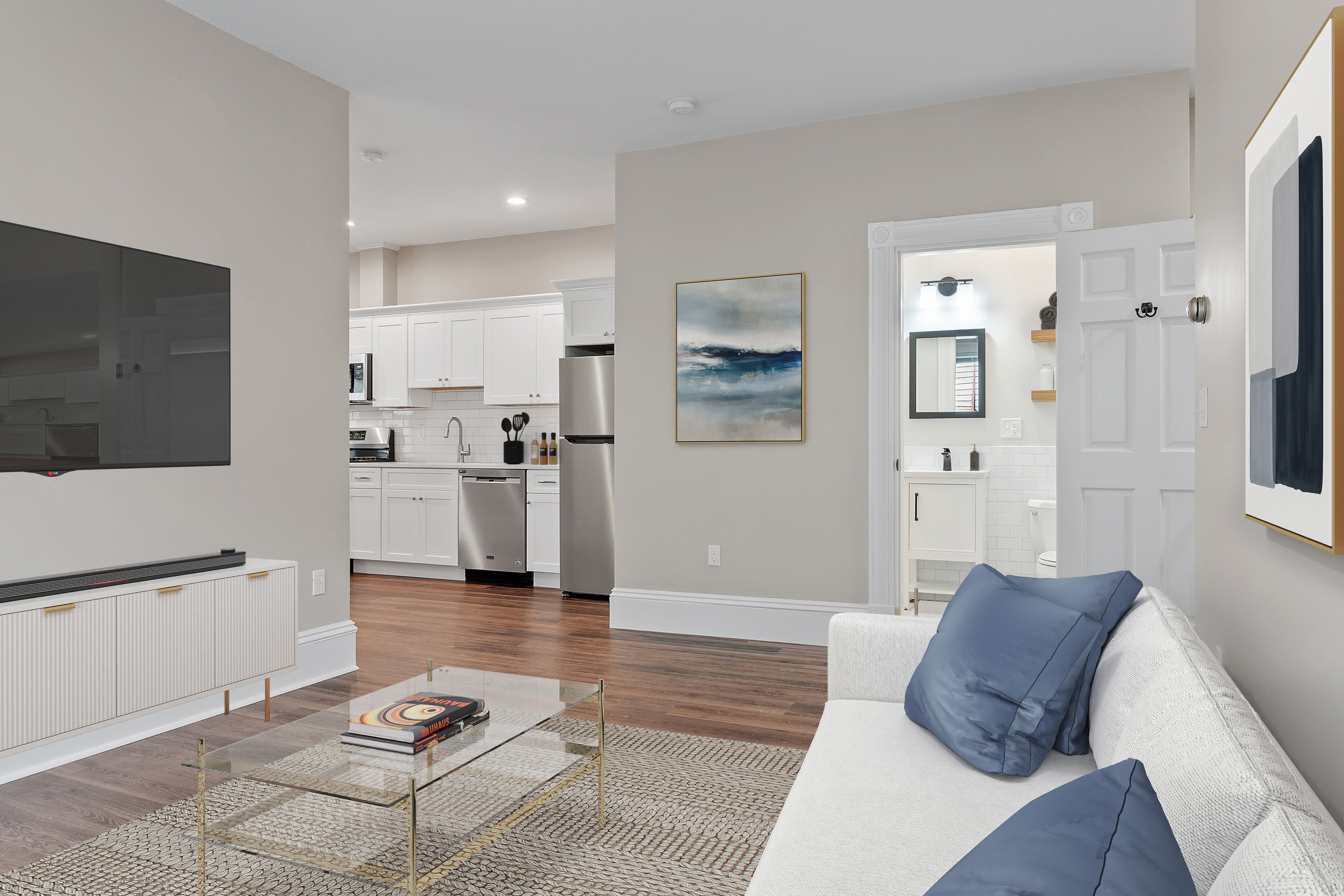 Portfolio Image: Living Room, Kitchen, and Bathroom